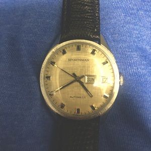 Sportsman automatic watch by Elgin. Original condition with minor wear.